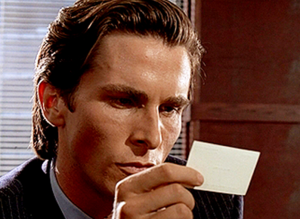 American Psycho Scene Where Patrick Carefully Inspects His Co-Workers Business Card